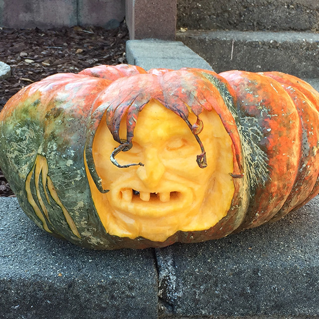 Halloween pumpkin carved like a scary face